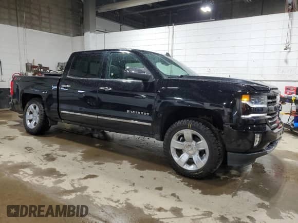 2018 Chevrolet Silverado 1500 LTZ с VIN 3GCUKSEJ9JG598093, выставлен на аукционе Copart как лот 57244485 с пробегом 154 558 миль миль и Списание • Salvage title. История ставок и продаж доступна на DreamBid. Изображение 4.