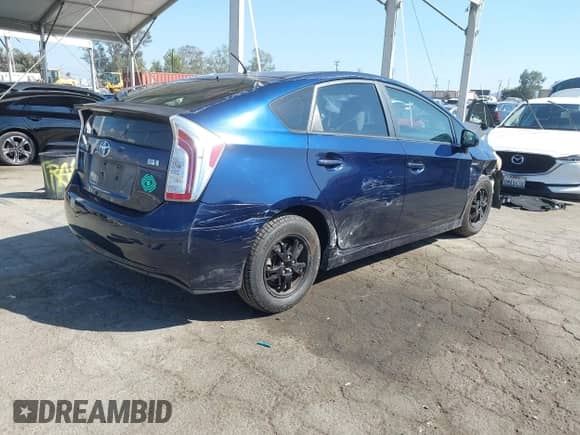 2012 Toyota Prius One with VIN JTDKN3DU6C1484280, listed as a IAAI auction lot 43271294 with 161,229 mi miles and . Bid and sale history available at DreamBid. Image 4.