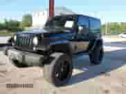 2014 Jeep Wrangler Sahara with VIN 1C4AJWBG6EL304907, listed as a IAAI auction lot 42007310 with 53,277 mi miles and . Bid and sale history available at DreamBid. Image 2.