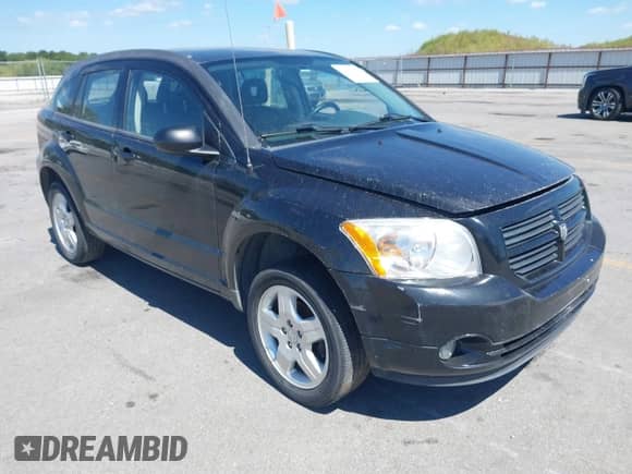 2009 Dodge Caliber SXT with VIN 1B3HB48A59D183646, listed as a IAAI auction lot 43048308 with 152,808 mi miles and . Bid and sale history available at DreamBid. Image 1.