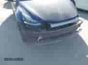 2022 Tesla Model Y Long Range z VIN 7SAYGDEE9NF443673, wystawiony jako IAAI lot #42878246 z przebiegiem 65 689 mil mil oraz . Historia ofert i sprzedaży dostępna na DreamBid. Obrazek 6.