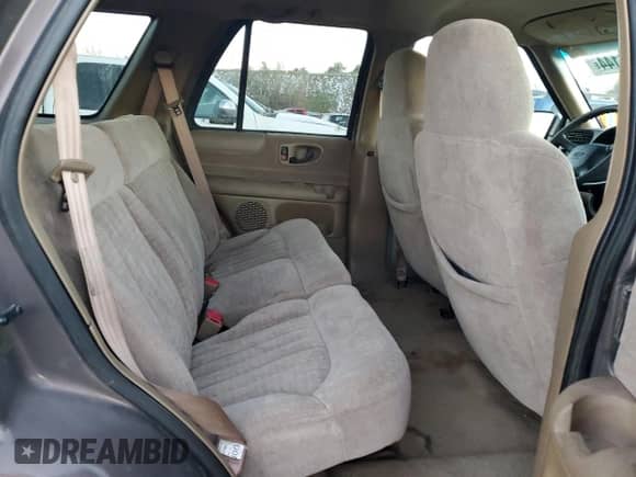 2000 Chevrolet Blazer LS z VIN 1GNCS13W7YK218263, wystawiony jako Copart lot #80774144 z przebiegiem 76 764 mil mil oraz Szkoda całkowita • Salvage title. Historia ofert i sprzedaży dostępna na DreamBid. Obrazek 11.