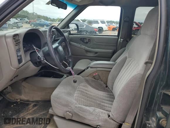 2002 Chevrolet Blazer LS with VIN 1GNCS13W12K134186, listed as a Copart auction lot 83329734 with 123,014 mi miles and Clean title. Bid and sale history available at DreamBid. Image 7.