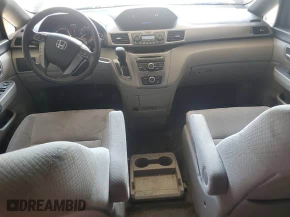 2015 Honda Odyssey LX with VIN 5FNRL5H24FB115955, listed as a Copart auction lot 61471335 with 114,741 mi miles and Salvage title. Bid and sale history available at DreamBid. Image 8.