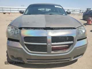 2006 Dodge Magnum with VIN 2D4FV47V96H123856, listed as a Copart auction lot 68228655 with 150,925 mi miles and Salvage title. Bid and sale history available at DreamBid. Image 5.
