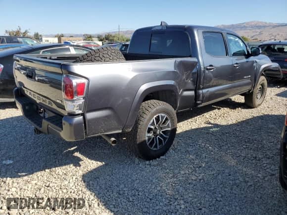 2022 Toyota Tacoma SR5 с VIN 3TMDZ5BN2NM132324, выставлен на аукционе Copart как лот 81694695 с пробегом 44 765 миль миль и Списание • Salvage title. История ставок и продаж доступна на DreamBid. Изображение 3.