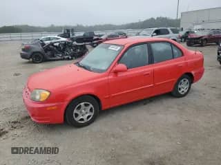 2005 Hyundai Accent GLS z VIN KMHCG45C05U621897, wystawiony jako Copart lot #68454165 z przebiegiem 195 234 mil mil oraz Czysty tytuł • Clean title. Historia ofert i sprzedaży dostępna na DreamBid. Obrazek 1.