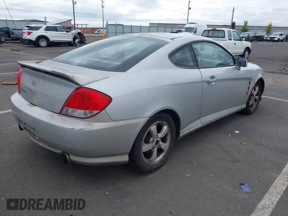 2006 Hyundai Tiburon GS с VIN KMHHM65D96U214567, выставлен на аукционе IAAI как лот 43186129 с пробегом 202 822 миль миль и . История ставок и продаж доступна на DreamBid. Изображение 4.