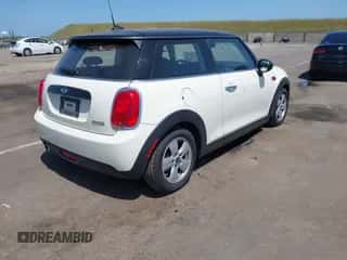 2017 MINI Hardtop Cooper with VIN WMWXP5C39H2D71459, listed as a IAAI auction lot 42111245 with 97,759 mi miles and . Bid and sale history available at DreamBid. Image 4.