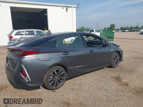 2018 Toyota Prius Plus z VIN JTDKARFP2J3072803, wystawiony jako IAAI lot #42443376 z przebiegiem 120 009 mil mil oraz . Historia ofert i sprzedaży dostępna na DreamBid. Obrazek 4.