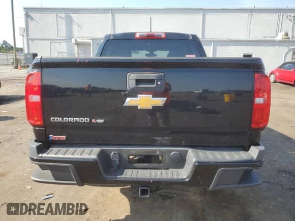 2019 Chevrolet Colorado 2WD Work Truck z VIN 1GCGSBEN6K1336788, wystawiony jako Copart lot #66315665 z przebiegiem 65 604 mil mil oraz Szkoda całkowita • Salvage title. Historia ofert i sprzedaży dostępna na DreamBid. Obrazek 6.