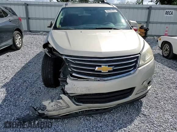 2015 Chevrolet Traverse LT with VIN 1GNKRHKDXFJ169210, listed as a Copart auction lot 82386595 with 118,026 mi miles and Salvage title. Bid and sale history available at DreamBid. Image 14.