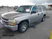 2004 Chevrolet Suburban LT z VIN 1GNEC16Z74J107885, wystawiony jako IAAI lot #42686925 z przebiegiem 232 388 mil mil oraz . Historia ofert i sprzedaży dostępna na DreamBid. Obrazek 2.