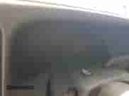 2004 Chevrolet Silverado 2500HD LS z VIN 1GCHC23U24F180122, wystawiony jako Copart lot #53521064 z przebiegiem Nie podano mil oraz Nie do naprawy • Non repairable. Historia ofert i sprzedaży dostępna na DreamBid. Obrazek 9.