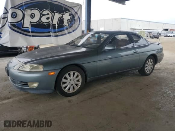 1992 Lexus SC 400 z VIN JT8UZ30C2N0002485, wystawiony jako Copart lot #89553365 z przebiegiem 260 100 mil mil oraz Czysty tytuł • Clean title. Historia ofert i sprzedaży dostępna na DreamBid. Obrazek 1.