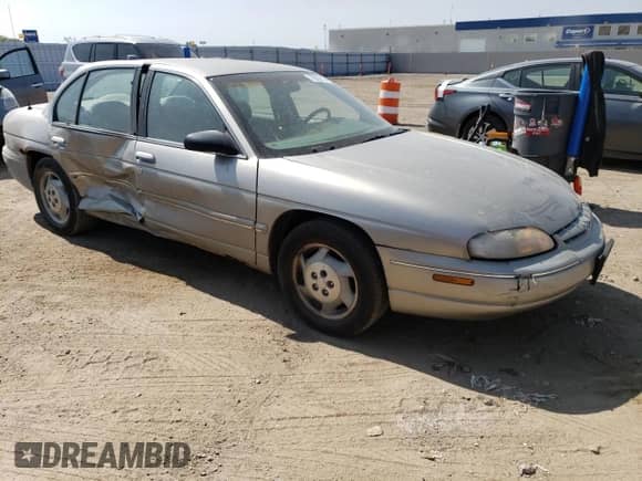 1999 Chevrolet Lumina с VIN 2G1WL52M5X9126135, выставлен на аукционе Copart как лот 70958174 с пробегом 171 336 миль миль и Списание • Salvage title. История ставок и продаж доступна на DreamBid. Изображение 4.