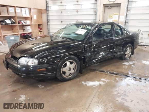 1999 Chevrolet Monte Carlo SS z VIN 2G1WX12K9X9155312, wystawiony jako IAAI lot #41701304 z przebiegiem 52 603 mil mil oraz . Historia ofert i sprzedaży dostępna na DreamBid. Obrazek 2.