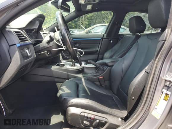 2015 BMW 4 Series 435i with VIN WBA4B1C51FG241443, listed as a Copart auction lot 61026285 with 149,384 mi miles and Salvage title. Bid and sale history available at DreamBid. Image 7.