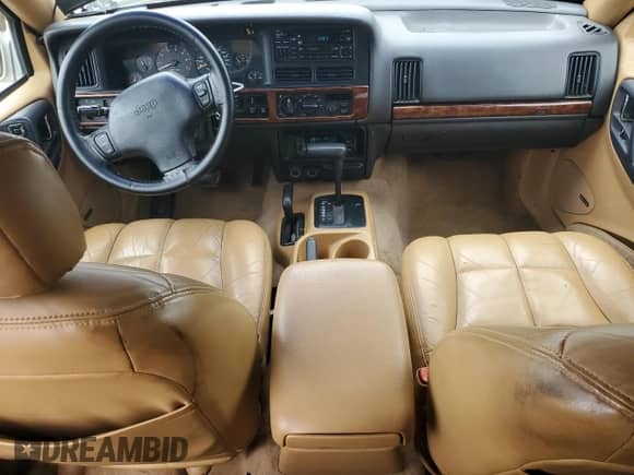 1997 Jeep Grand Cherokee Limited с VIN 1J4GZ78S9VC623295, выставлен на аукционе Copart как лот 58552495 с пробегом 197 818 миль миль и Чистый • Clean title. История ставок и продаж доступна на DreamBid. Изображение 8.