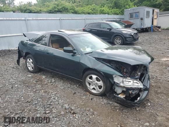 1999 Honda Accord EX z VIN 1HGCG2259XA002235, wystawiony jako Copart lot #56853225 z przebiegiem Nie podano mil oraz Szkoda całkowita • Salvage title. Historia ofert i sprzedaży dostępna na DreamBid. Obrazek 4.