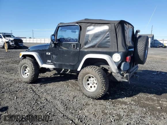 2003 Jeep Wrangler X z VIN 1J4FA39S73P346680, wystawiony jako Copart lot #86513335 z przebiegiem Nie podano mil oraz Szkoda całkowita • Salvage title. Historia ofert i sprzedaży dostępna na DreamBid. Obrazek 2.