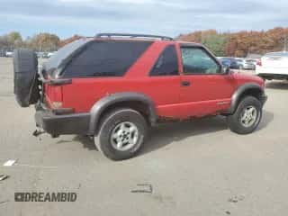 2000 Chevrolet Blazer LS z VIN 1GNCT18W8YK155812, wystawiony jako Copart lot #77315424 z przebiegiem 151 418 mil mil oraz Czysty tytuł • Clean title. Historia ofert i sprzedaży dostępna na DreamBid. Obrazek 3.