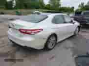 2019 Toyota Camry SE z VIN 4T1B11HK5KU720581, wystawiony jako IAAI lot #42300818 z przebiegiem 136 779 mil mil oraz . Historia ofert i sprzedaży dostępna na DreamBid. Obrazek 4.