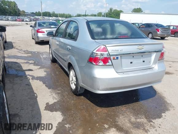 2011 Chevrolet Aveo 1LT with VIN KL1TD5DE9BB134041, listed as a IAAI auction lot 42621873 with 126,035 mi miles and . Bid and sale history available at DreamBid. Image 3.