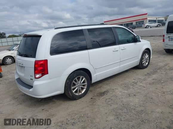 2014 Dodge Grand Caravan SXT with VIN 2C4RDGCG0ER152726, listed as a IAAI auction lot 43232494 with 162,088 mi miles and . Bid and sale history available at DreamBid. Image 4.