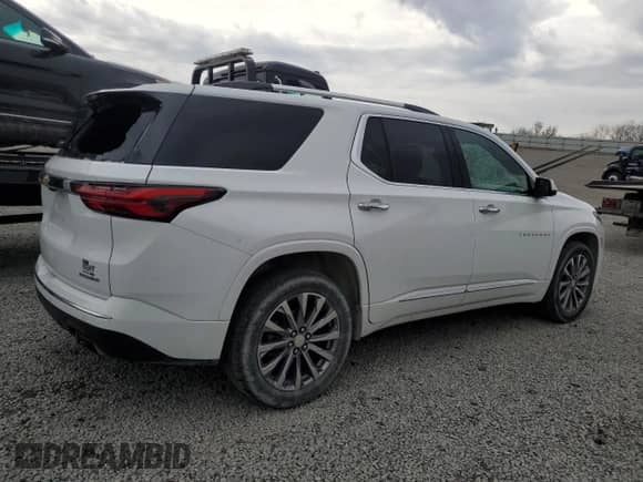 2022 Chevrolet Traverse Premier с VIN 1GNERKKW0NJ145251, выставлен на аукционе Copart как лот 50500235 с пробегом 69 593 миль миль и Списание • Salvage title. История ставок и продаж доступна на DreamBid. Изображение 3.