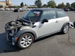 2013 MINI Hardtop with VIN WMWSU3C58DT371379, listed as a Copart auction lot 59606005 with 59,901 mi miles and Salvage title. Bid and sale history available at DreamBid. Image 1.