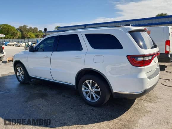 2015 Dodge Durango Limited with VIN 1C4RDHDG6FC722596, listed as a Copart auction lot 89675185 with 120,295 mi miles and Salvage title. Bid and sale history available at DreamBid. Image 2.