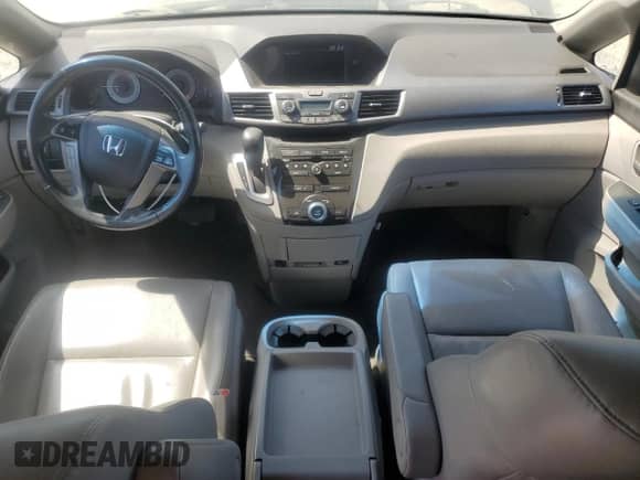2013 Honda Odyssey EX-L с VIN 5FNRL5H65DB015041, выставлен на аукционе Copart как лот 61610385 с пробегом 177 790 миль миль и Списание • Salvage title. История ставок и продаж доступна на DreamBid. Изображение 8.
