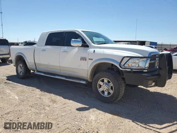 2012 Dodge RAM with VIN 3C6TD5NT8CG256511, listed as a Copart auction lot 54652174 with 196,559 mi miles and Salvage title. Bid and sale history available at DreamBid. Image 4.