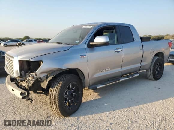 2012 Toyota Tundra Limited z VIN 5TFSY5F18CX132627, wystawiony jako Copart lot #75347174 z przebiegiem 160 032 mil mil oraz Szkoda całkowita • Salvage title. Historia ofert i sprzedaży dostępna na DreamBid. Obrazek 1.