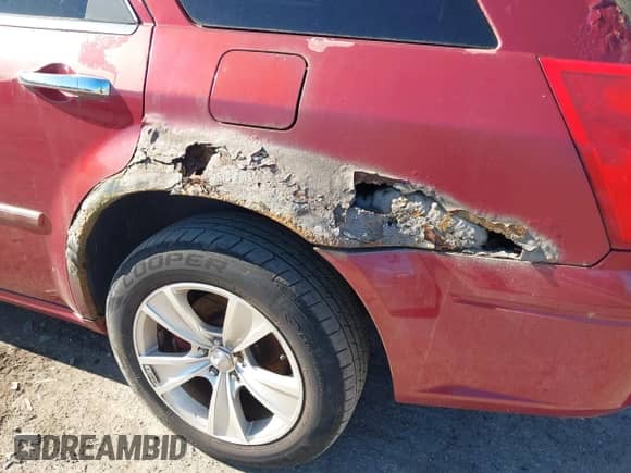 2005 Dodge Magnum with VIN 2D8GZ58275H611123, listed as a IAAI auction lot 41766191 with 97,736 mi miles and . Bid and sale history available at DreamBid. Image 6.