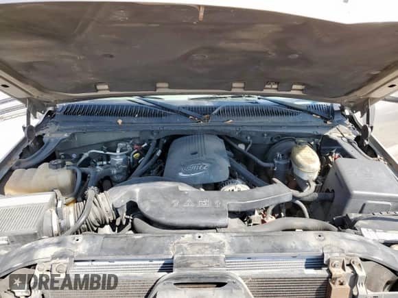 2003 Chevrolet Tahoe LS z VIN 1GNEC13Z13R103867, wystawiony jako Copart lot #84484325 z przebiegiem Nie podano mil oraz Szkoda całkowita • Salvage title. Historia ofert i sprzedaży dostępna na DreamBid. Obrazek 12.