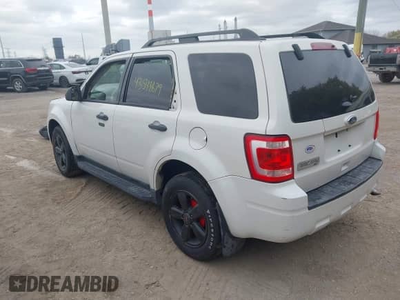 2011 Ford Escape XLT with VIN 1FMCU9D72BKC09112, listed as a IAAI auction lot 43548679 with 134,229 mi miles and . Bid and sale history available at DreamBid. Image 3.
