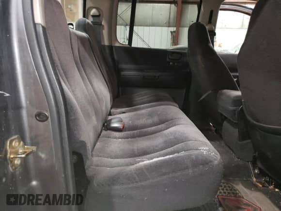 2003 Dodge Dakota Sport с VIN 1D7HG38N43S369703, выставлен на аукционе Copart как лот 79664404 с пробегом 225 257 миль миль и Списание • Salvage title. История ставок и продаж доступна на DreamBid. Изображение 10.