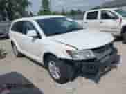 2012 Dodge Journey SXT z VIN 3C4PDCBB0CT323569, wystawiony jako IAAI lot #42748440 z przebiegiem 141 950 mil mil oraz . Historia ofert i sprzedaży dostępna na DreamBid. Obrazek 1.