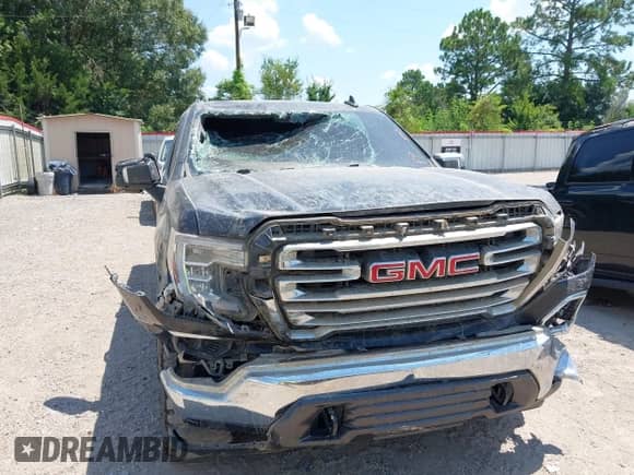 2022 GMC Sierra 1500 SLT with VIN 3GTU9DED6NG158436, listed as a IAAI auction lot 43065216 with 115,861 mi miles and . Bid and sale history available at DreamBid. Image 6.
