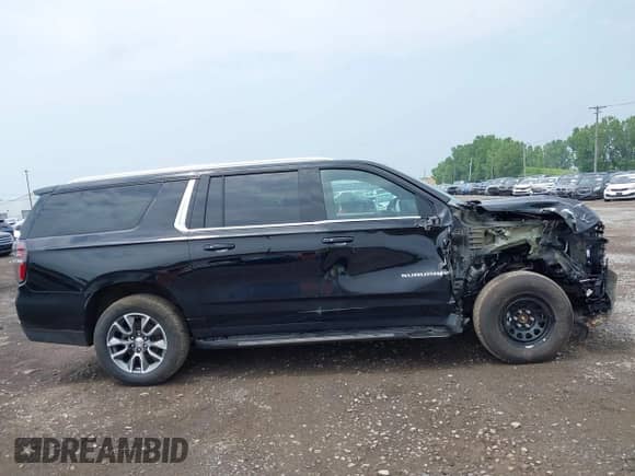 2024 Chevrolet Suburban LS z VIN 1GNSKBKD7RR116763, wystawiony jako IAAI lot #42744546 z przebiegiem 28 402 mil mil oraz . Historia ofert i sprzedaży dostępna na DreamBid. Obrazek 13.