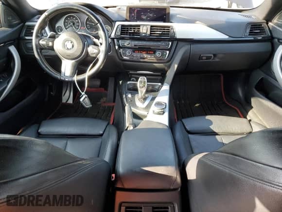 2015 BMW 4 Series 428i xDrive z VIN WBA4C9C59FD330304, wystawiony jako Copart lot #64786165 z przebiegiem 156 889 mil mil oraz Szkoda całkowita • Salvage title. Historia ofert i sprzedaży dostępna na DreamBid. Obrazek 8.