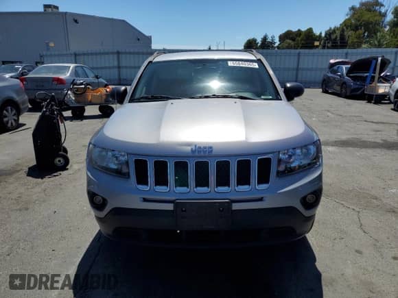 2014 Jeep Compass Sport с VIN 1C4NJDBB5ED926838, выставлен на аукционе Copart как лот 65840365 с пробегом 100 398 миль миль и Списание • Salvage title. История ставок и продаж доступна на DreamBid. Изображение 5.