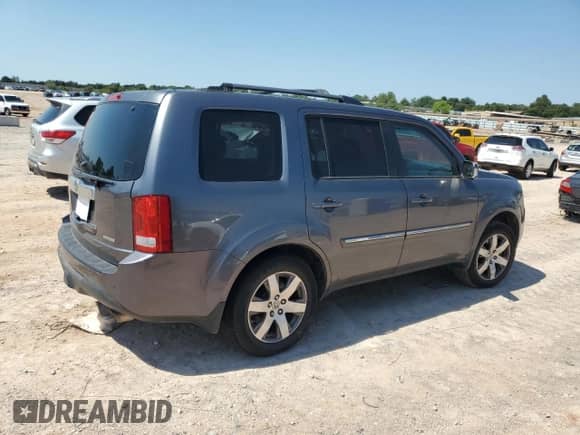 2014 Honda Pilot Touring with VIN 5FNYF3H94EB021903, listed as a Copart auction lot 71323565 with 96,054 mi miles and Salvage title. Bid and sale history available at DreamBid. Image 3.