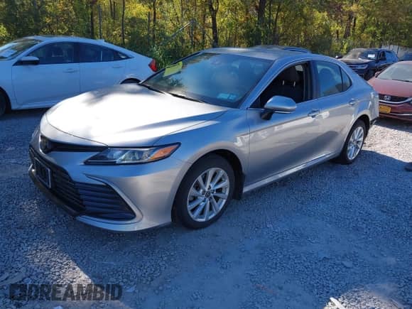 2023 Toyota Camry LE z VIN 4T1C11AK8PU757761, wystawiony jako IAAI lot #43340611 z przebiegiem 28 919 mil mil oraz . Historia ofert i sprzedaży dostępna na DreamBid. Obrazek 17.