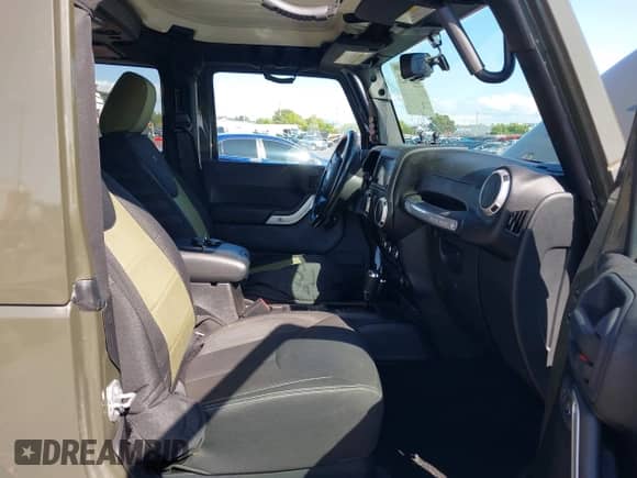 2015 Jeep Wrangler Rubicon Hard Rock z VIN 1C4BJWCGXFL771669, wystawiony jako IAAI lot #42057423 z przebiegiem 36 996 mil mil oraz . Historia ofert i sprzedaży dostępna na DreamBid. Obrazek 5.