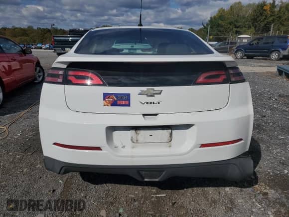 2013 Chevrolet Volt с VIN 1G1RA6E49DU115755, выставлен на аукционе Copart как лот 87307455 с пробегом 95 133 миль миль и Списание • Salvage title. История ставок и продаж доступна на DreamBid. Изображение 6.