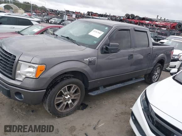 2014 Ford F-150 XL with VIN 1FTFW1CF9EKF88068, listed as a IAAI auction lot 41267682 with 119,281 mi miles and . Bid and sale history available at DreamBid. Image 2.