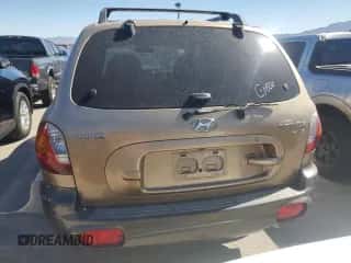 2003 Hyundai Santa Fe GLS z VIN KM8SC13D53U558567, wystawiony jako Copart lot #70406325 z przebiegiem Nie podano mil oraz Nie do naprawy • Non repairable. Historia ofert i sprzedaży dostępna na DreamBid. Obrazek 6.